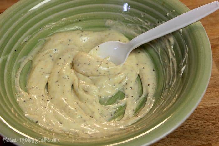 combining the dressing in a bowl