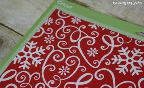 wrapping paper on a cricut cutting mat