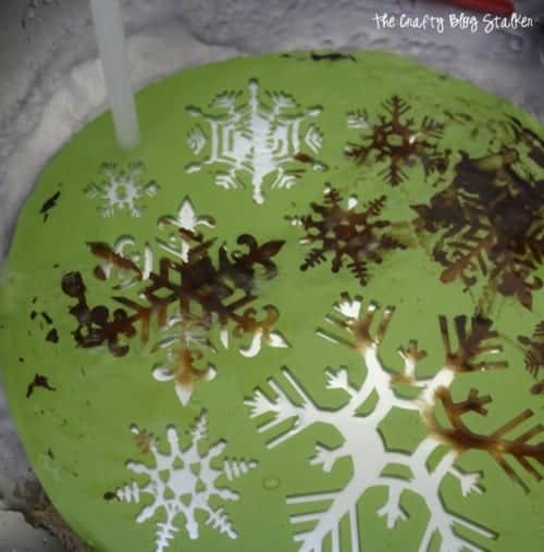 How to Make a Glass Etched Snowflake Candle Plate, a tutorial featured by top US craft blog, The Crafty Blog Stalker.
