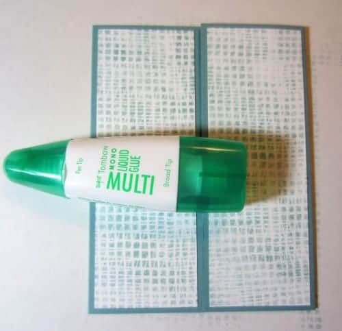 liquid glue used to adhere the paper card