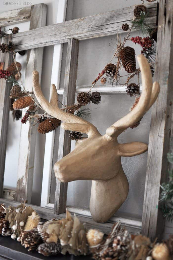 Super Cozy Christmas Mantel with drop cloth stockings, mini wreaths, pine cones, and a deer head!  Super Cozy Christmas Mantel with drop cloth stockings, mini wreaths, pine cones, and a deer head!