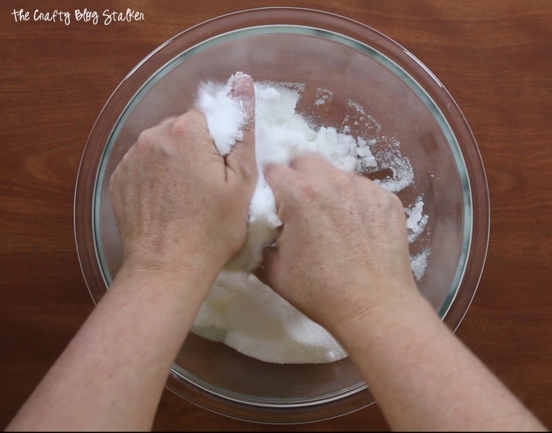 mixing sugar mixture with hands