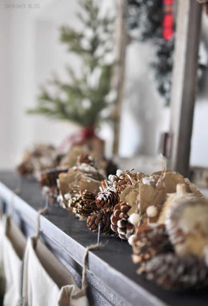 Super Cozy Christmas Mantel with drop cloth stockings, mini wreaths, pine cones, and a deer head!  Super Cozy Christmas Mantel with drop cloth stockings, mini wreaths, pine cones, and a deer head!