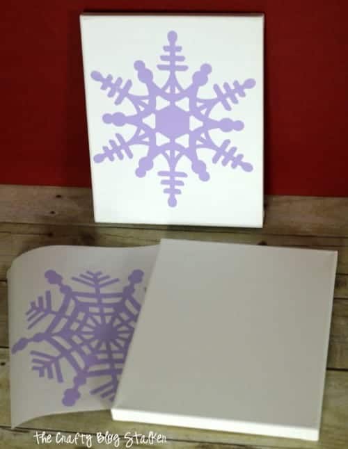 How to Make a Snowflake Finger Painted Canvas, a tutorial featured by top US craft blog, The Crafty Blog Stalker.