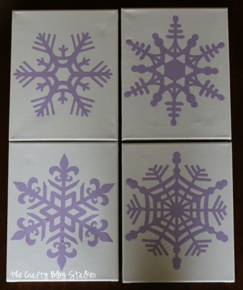 How to Make a Snowflake Finger Painted Canvas, a tutorial featured by top US craft blog, The Crafty Blog Stalker.