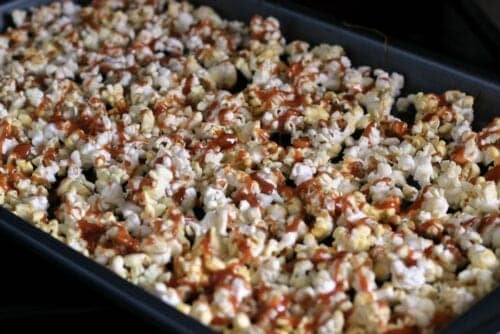 popcorn with melted caramel drizzled on top