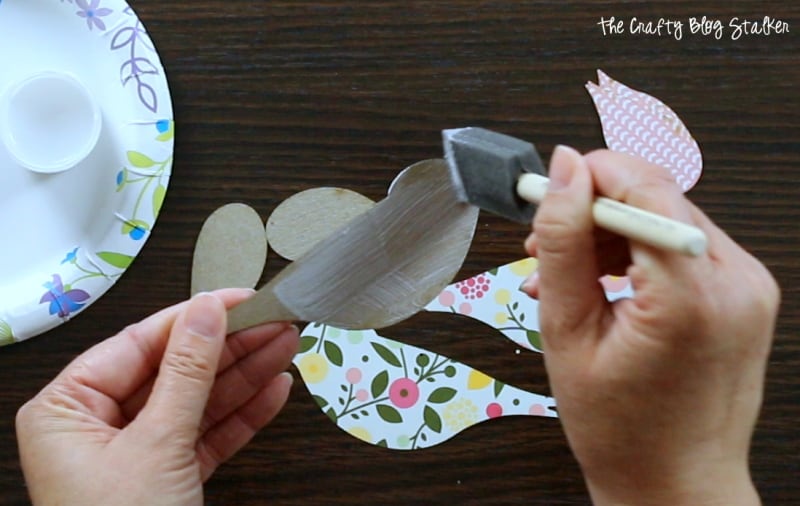 Hanging Bird Garland from the Flock Together Apostrophe S Craft Kit. Easy DIY craft tutorial idea for home decor, nursery decor or party decor.