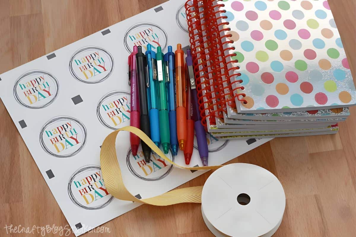 Printable PDF, pens, notebooks and ribbon to make birthday gifts.