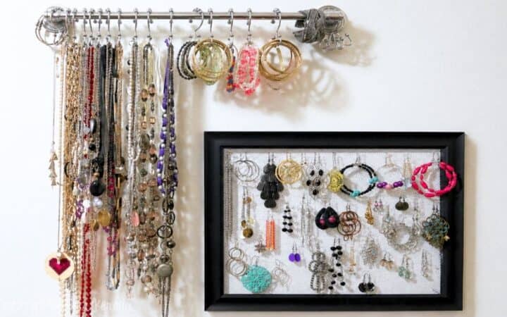 towel bar jewelry holder with an earring holder frame