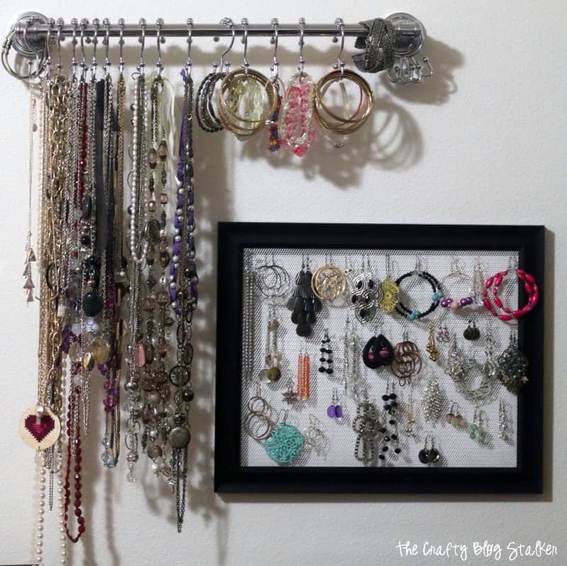 towel bar jewelry holder with an earring holder frame