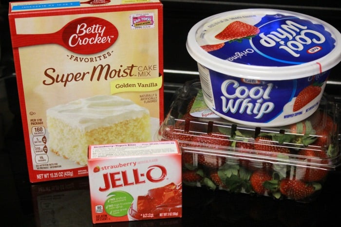 A cake mix, cool whip, strawberries, and jello mix.