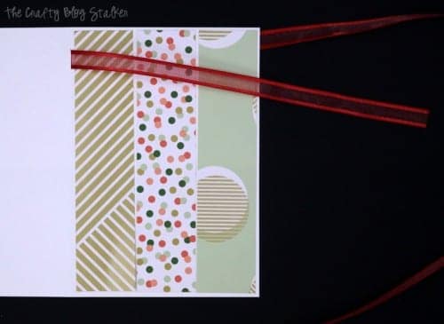 string ribbon through the cut slot in the side of the card