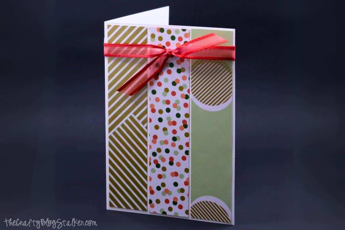 Any occasion handmade card with three panels and a ribbon bow.