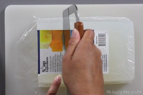 image of cutting a block of melt and pour soap