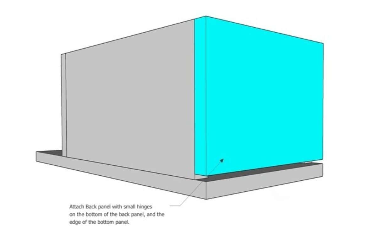 3D diagram showing how to attach the back panel with small hinges at the bottom edge for a hinged storage compartment on a wooden ride-on toy.