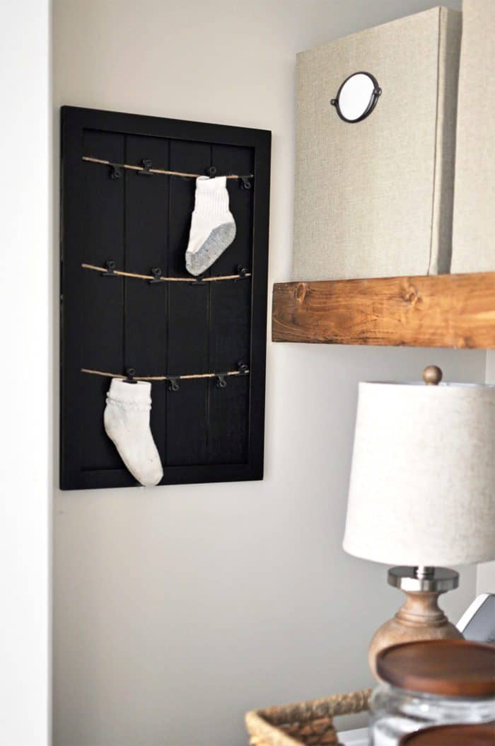 This Laundry Room Makeover transforms this little closet with wasted space into a functional laundry area with just a few simple changes! 