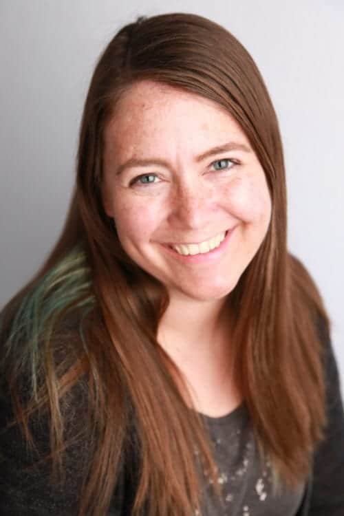 Katie Adams smiling with a white background