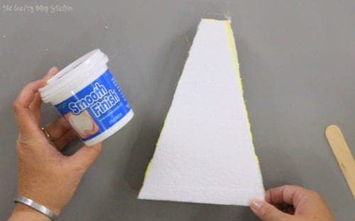 applying smooth finish to the styrofoam pieces for painting