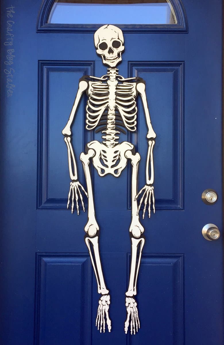 How to make a full skeleton. Perfect to hang on the front door for Halloween! A simple DIY craft tutorial for the Apostrophe S Craft Kit, Mr. Bones.