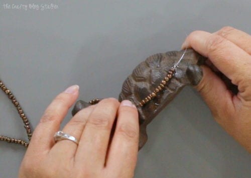 applying the seed beads to the turtle's shell