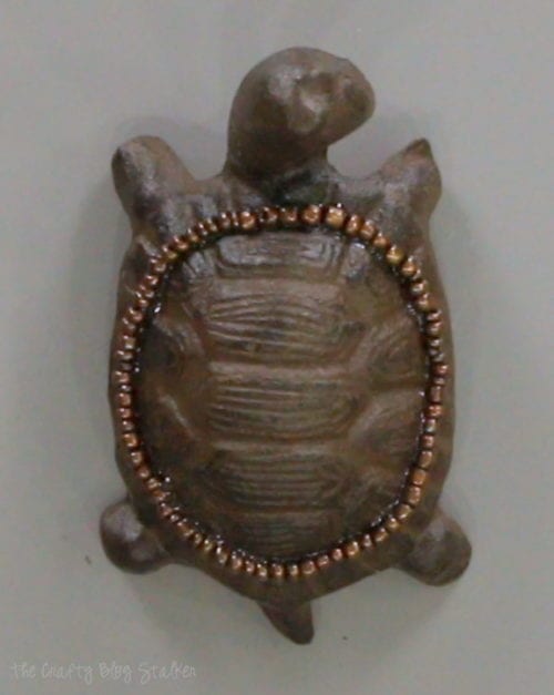 beads around the turtle's shell