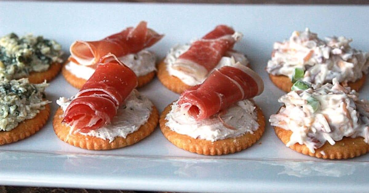 Easy cracker appetizers laid out on a plate.