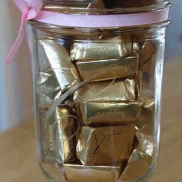 Glass etched candy jar with a monogram C.