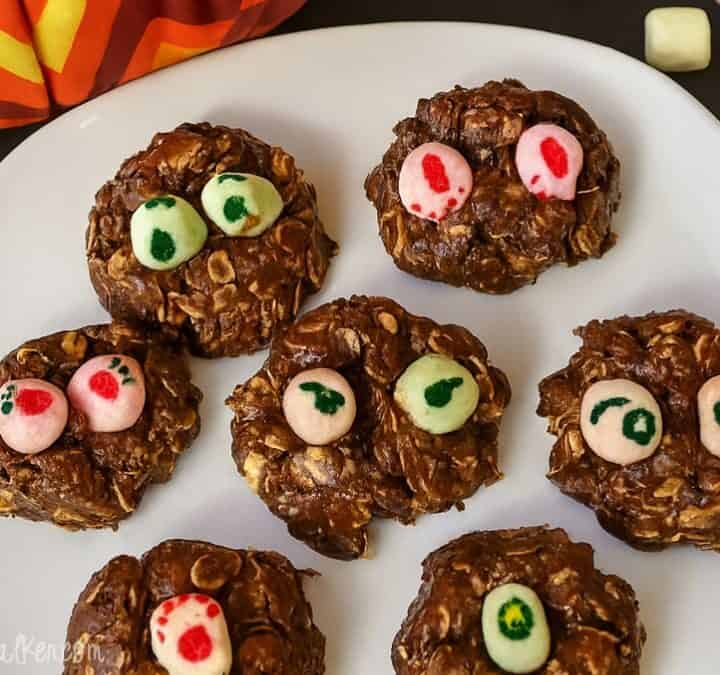 A plate of fun no-bake Nutella Monster Cookies topped with colorful marshmallow "eyes," perfect for a spooky treat that kids will love to make and eat!