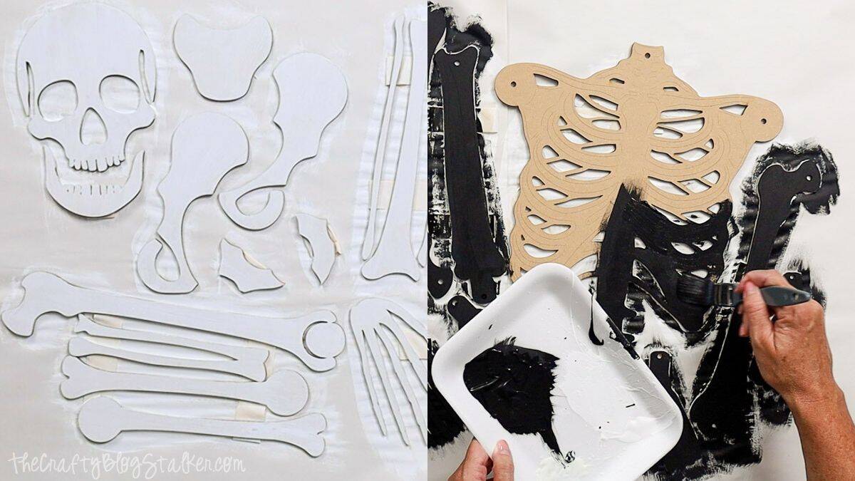 Laser cut skeleton pieces being painted, with white base coat on the left and black paint applied to ribcage and bones on the right.