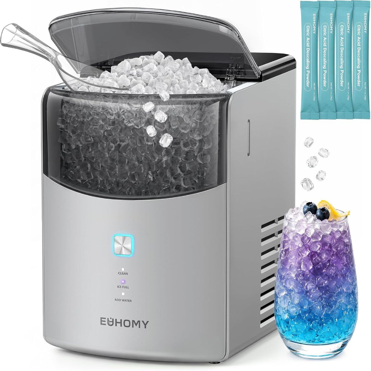 A black countertop ice maker filled with ice cubes, shown with a clear lid and a white scoop placed beside it.