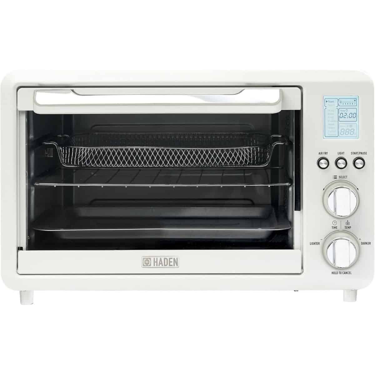 A white Haden toaster oven air fryer combo with digital controls, dual dials, and interior wire racks for baking and air frying.