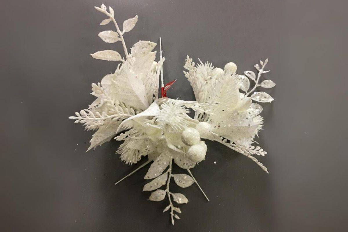 3 matching white floral picks to group together and place on the wreath.