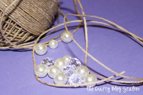 pearls, clear beads, and hemp twine