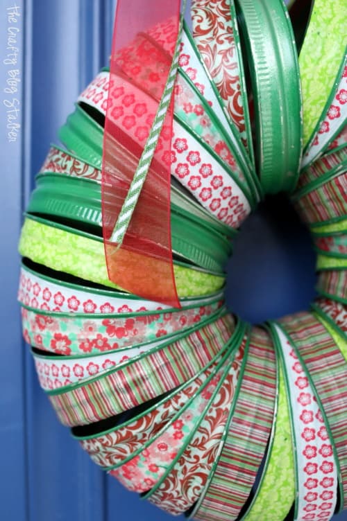 a closeup of the canning lid wreath