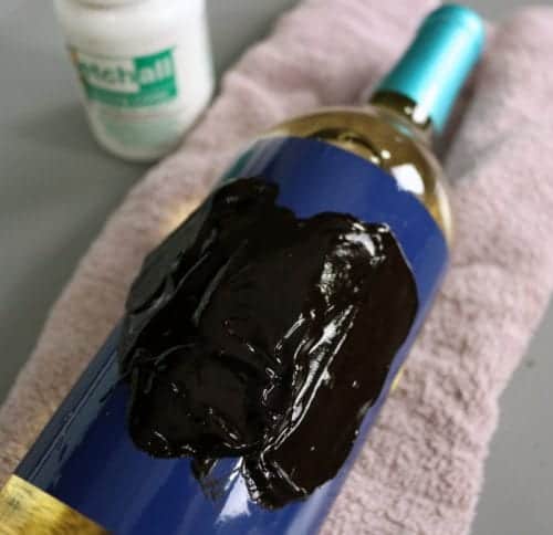 etch cream applied to a glass wine bottle