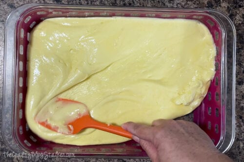 spreading the batter in a 9x13 baking pan