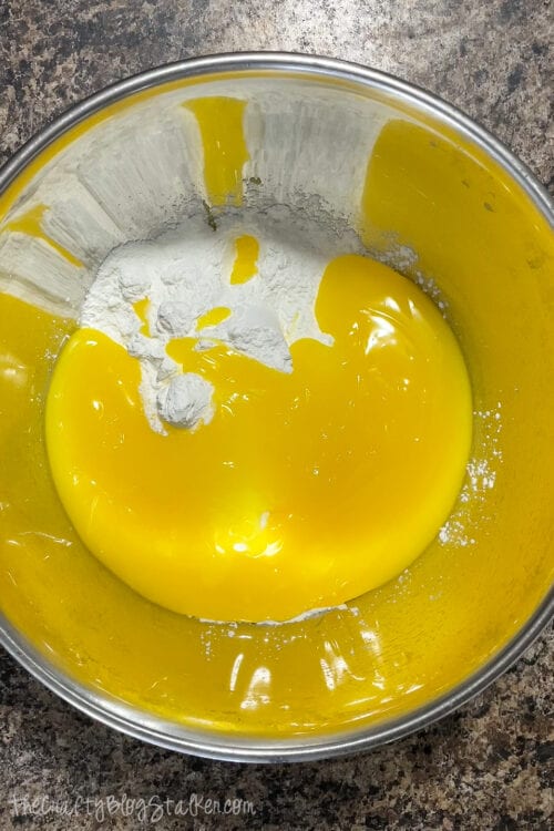 adding the lemon [pudding to the angel food cake mix