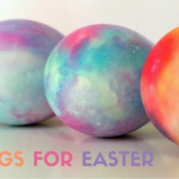 a row of dyed eggs for easter made with shaving cream and food coloring