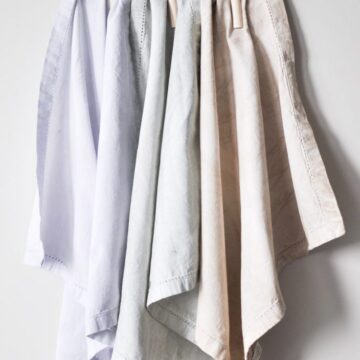 Enhance your next home decor project by learning how to dye fabric with milk paint and provide a timeless look for any project big or small!
