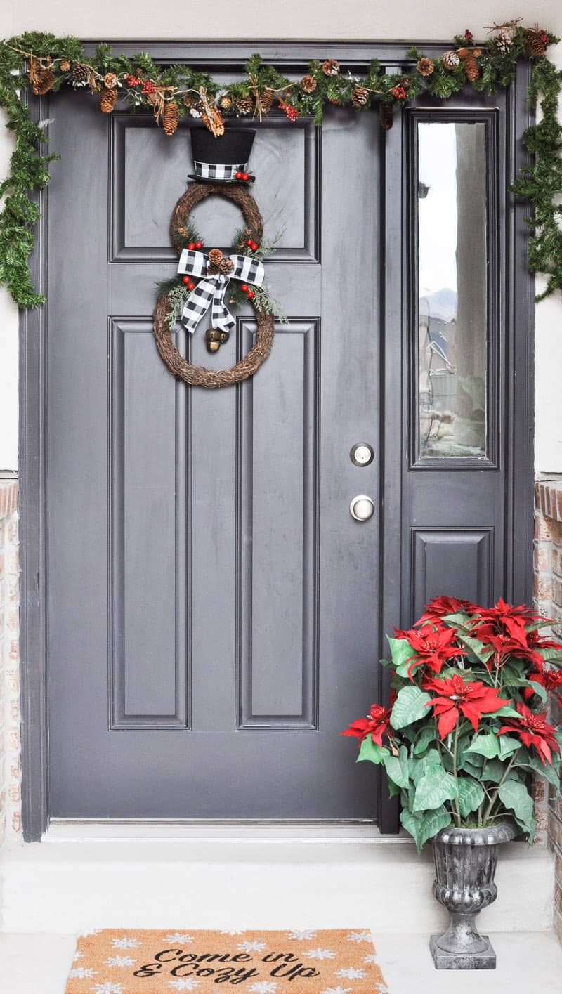 Come tour our Cozy Christmas Entryway decorated with comfy pillows, blankets and even a little hidden shoe storage!