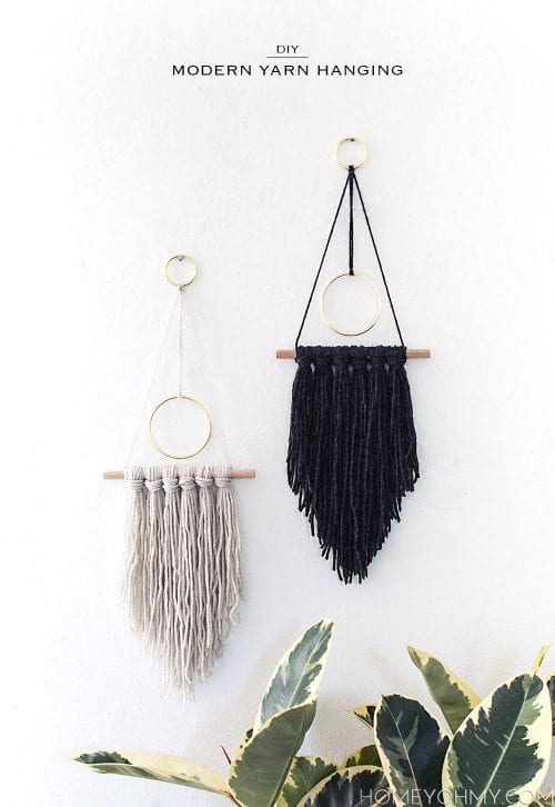 2 Modern Yarn Hangings. One in gray and one in black.