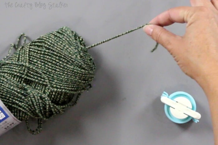 How to Make Pom Poms with the We R Memory Keepers Pom Pom Maker, a tutorial featured by top US craft blog, The Crafty Blog Stalker: yarn
