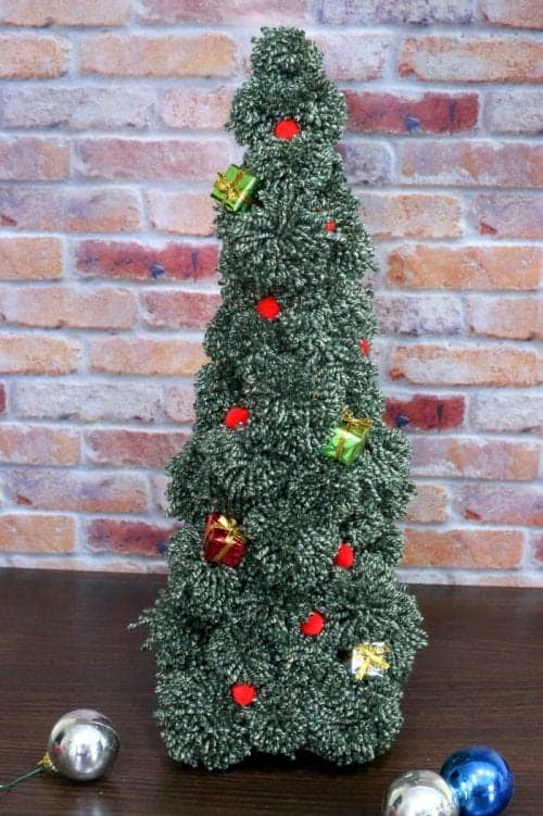 How to Make a Pom Pom Tree for Holiday Decor, a tutorial featured by top US craft blog, The Crafty Blog Stalker: decorated pom pom tree