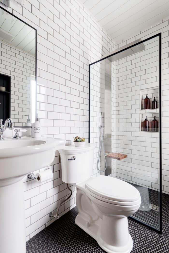 Come take a tour of this Black and White Industrial Bathroom before and after. This is proof small bathrooms can be luxurious.