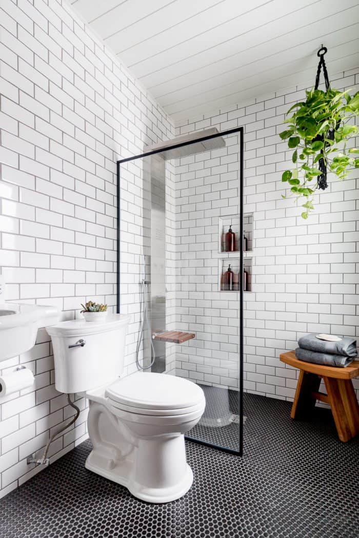 Hang plants in an industrial bathroom for an organic feel! 