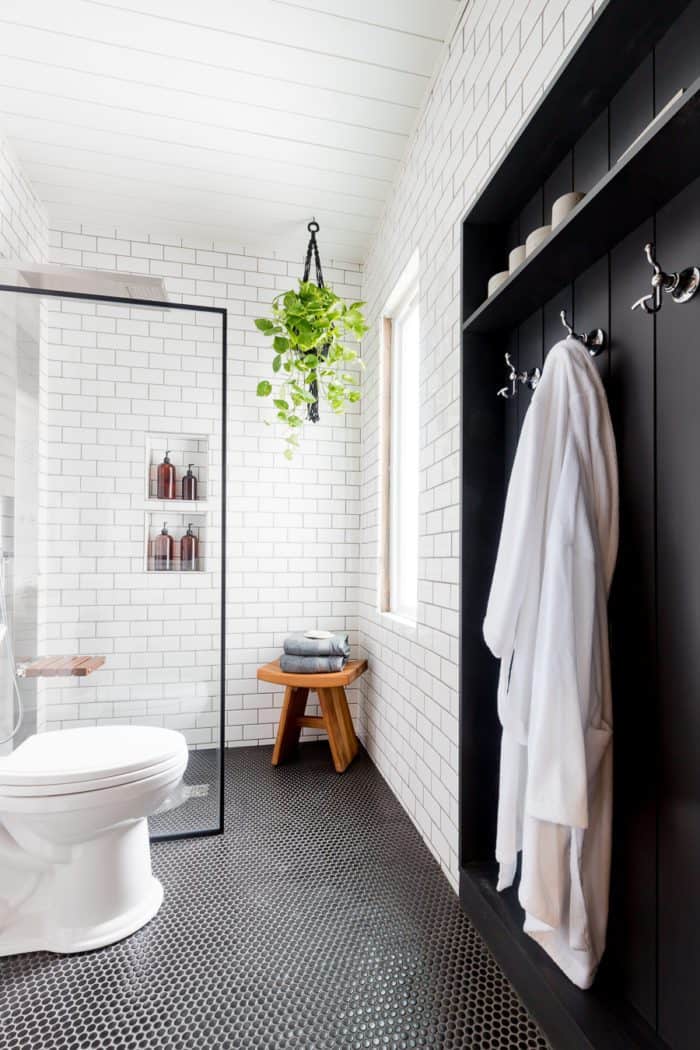 Beautiful place to hang towels in this industrial bathroom