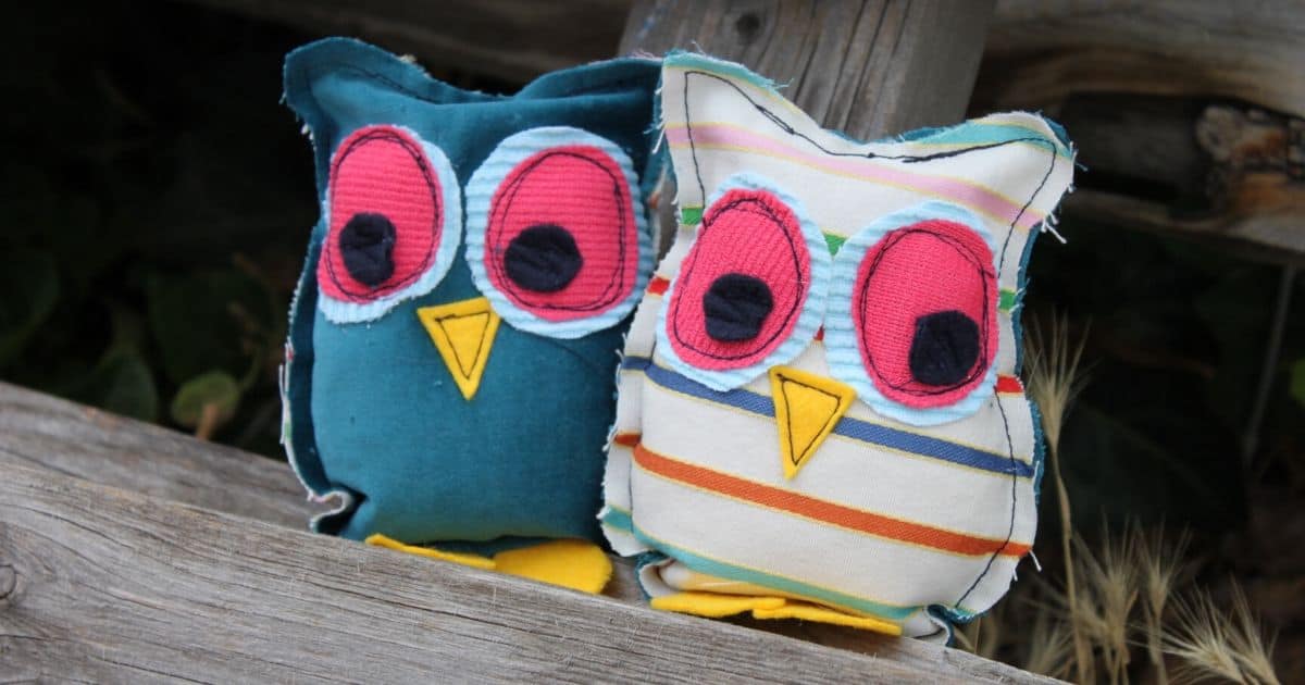 Two sewn owl stuffies.