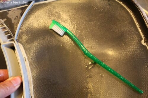 How To Clean The Dryer Lint Trap - Frugally Blonde