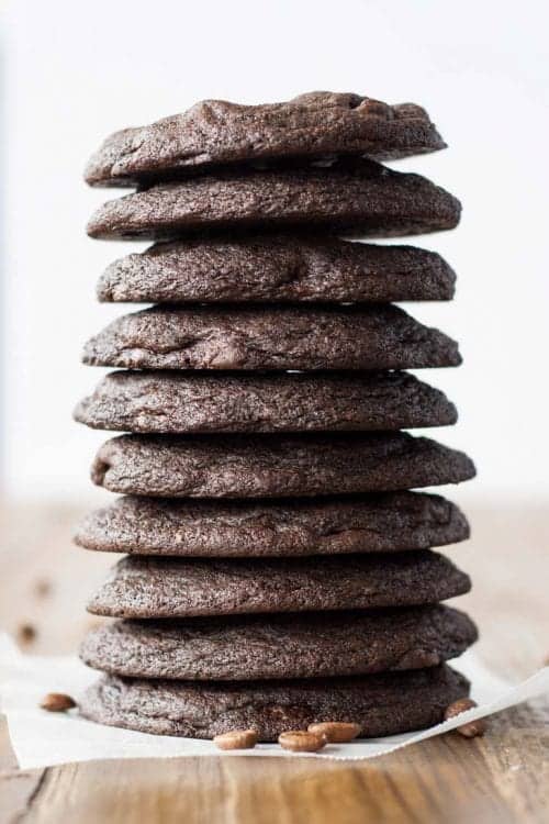 a tall stack of dark chocolate expresso cookies