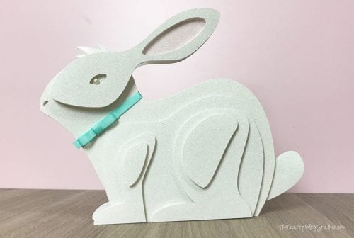finished layered paper art bunny with a pink background